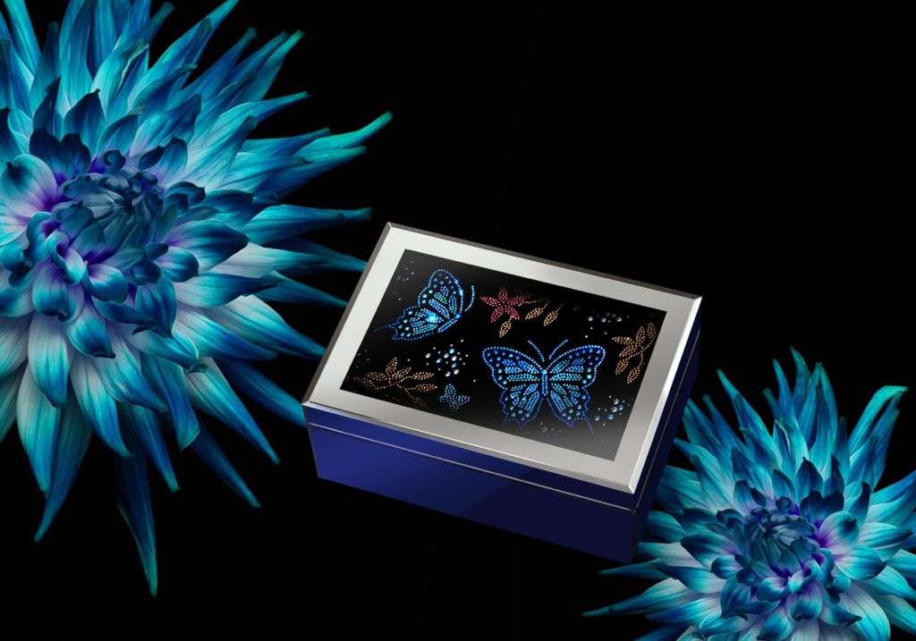 02 The butterfly symbolizes liveliness and happiness and is represented by the dazzling cobalt blue and rose studs.