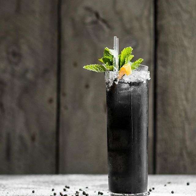 A dark-colored cocktail at Aurora, Altira Hotel, Macau