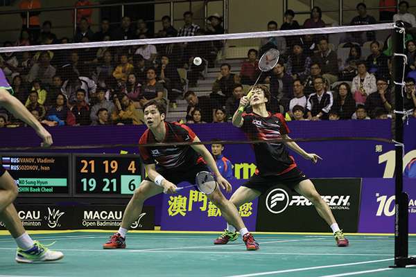 Two men playing badminton at 2016 Macau Open Badminton