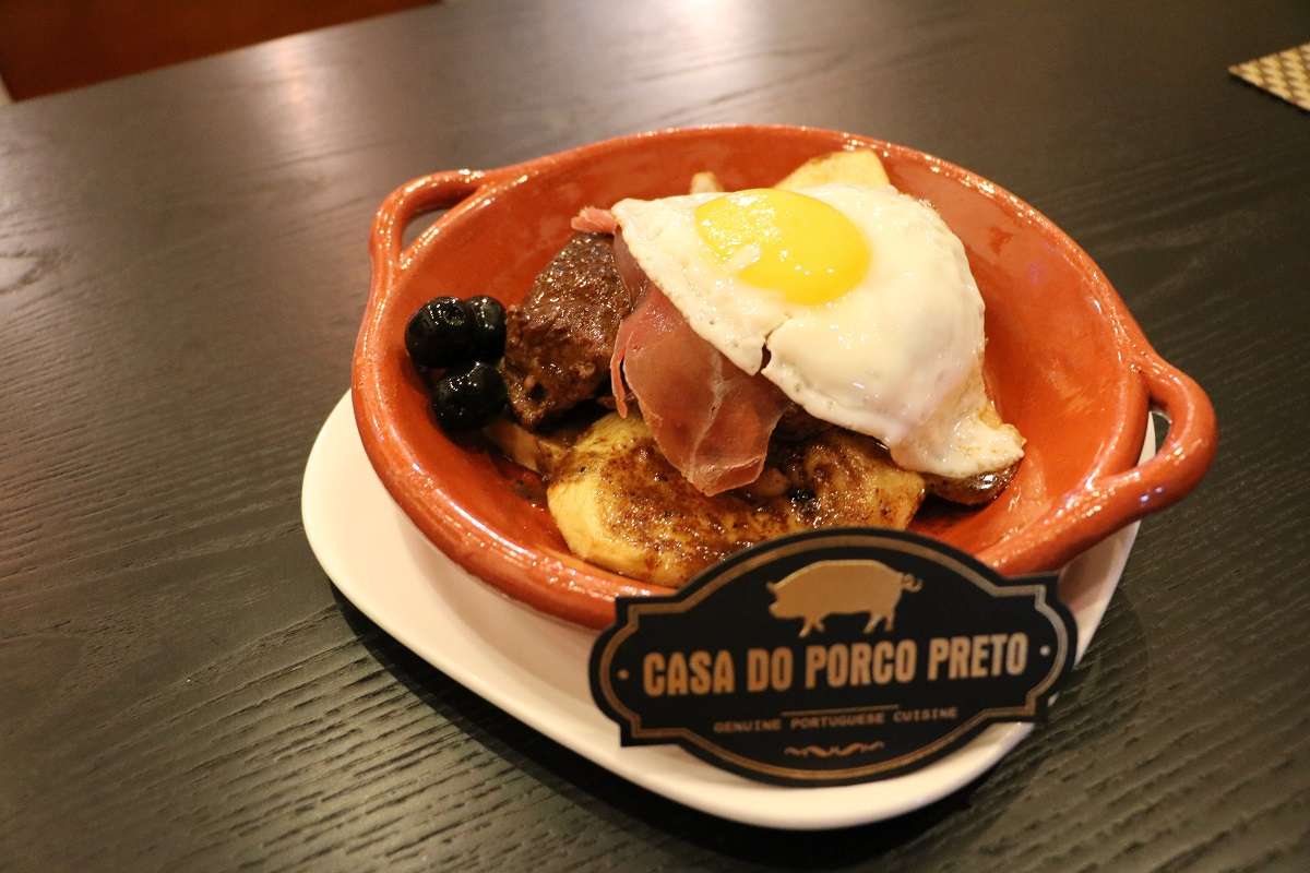 Classic Portuguese steak dish on a table. 