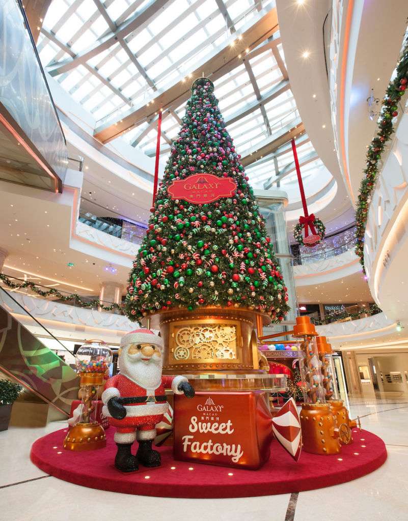 A giant Christmas tree and Santa Claus decoration at Galaxy Macau. 