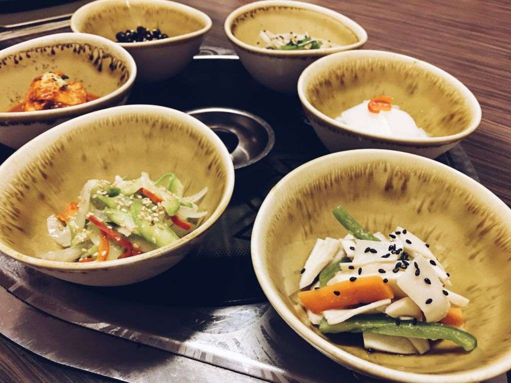 Korean dishes on a table.