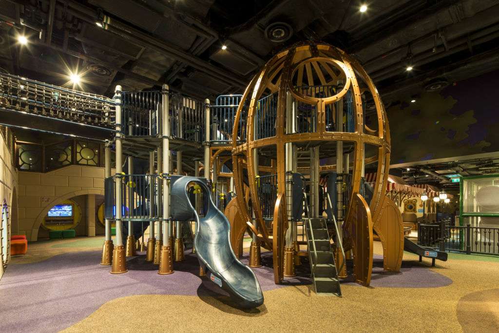 Indoor rocket shaped playground with slide