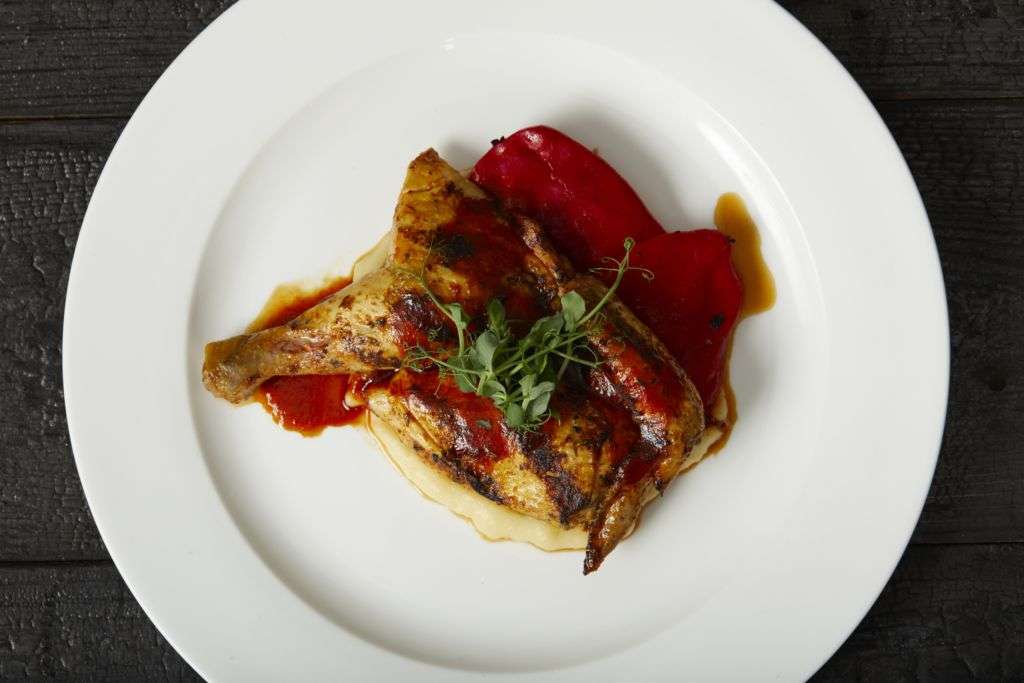 Blue Butcher and Meat Specialist Fresh organic free range baby chicken, potato puree, grilled Spanish peppers, jus