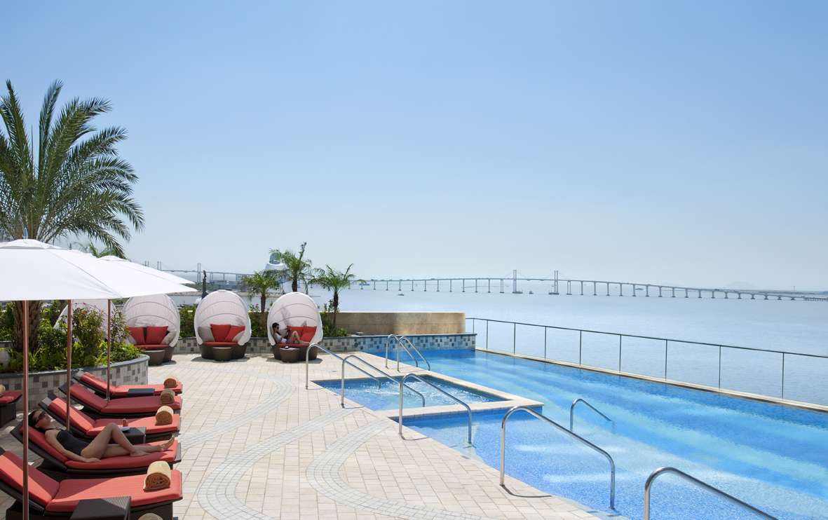 Pool at Mandarin Oriental Macau in the sun pool days by mo macau events august