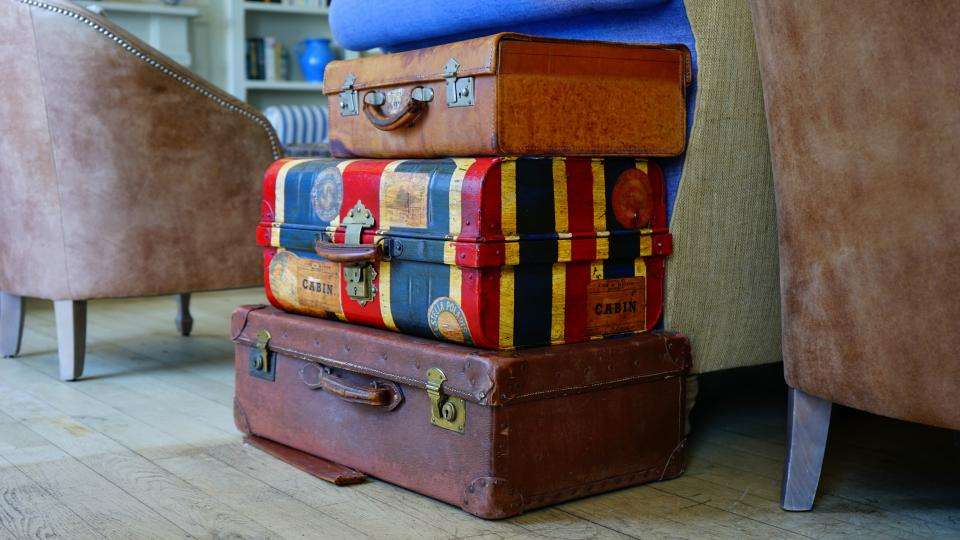 Suitcases stacked on top of each other