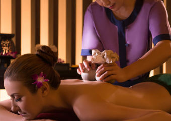 A close up of woman receiving massage at Banyan Tree spa in Macau.