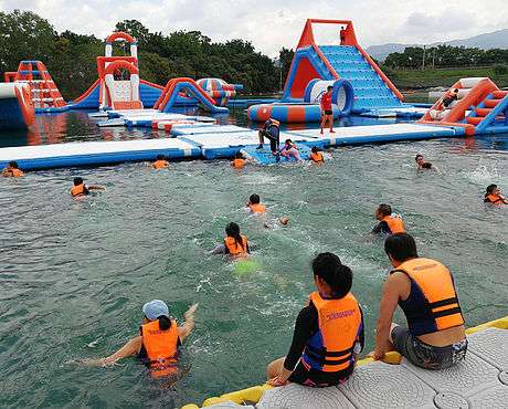 People swimming at Core Aqua Park in Hong Kong. 