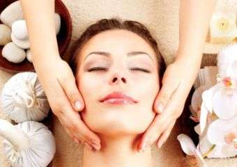 A woman receives a face massage.