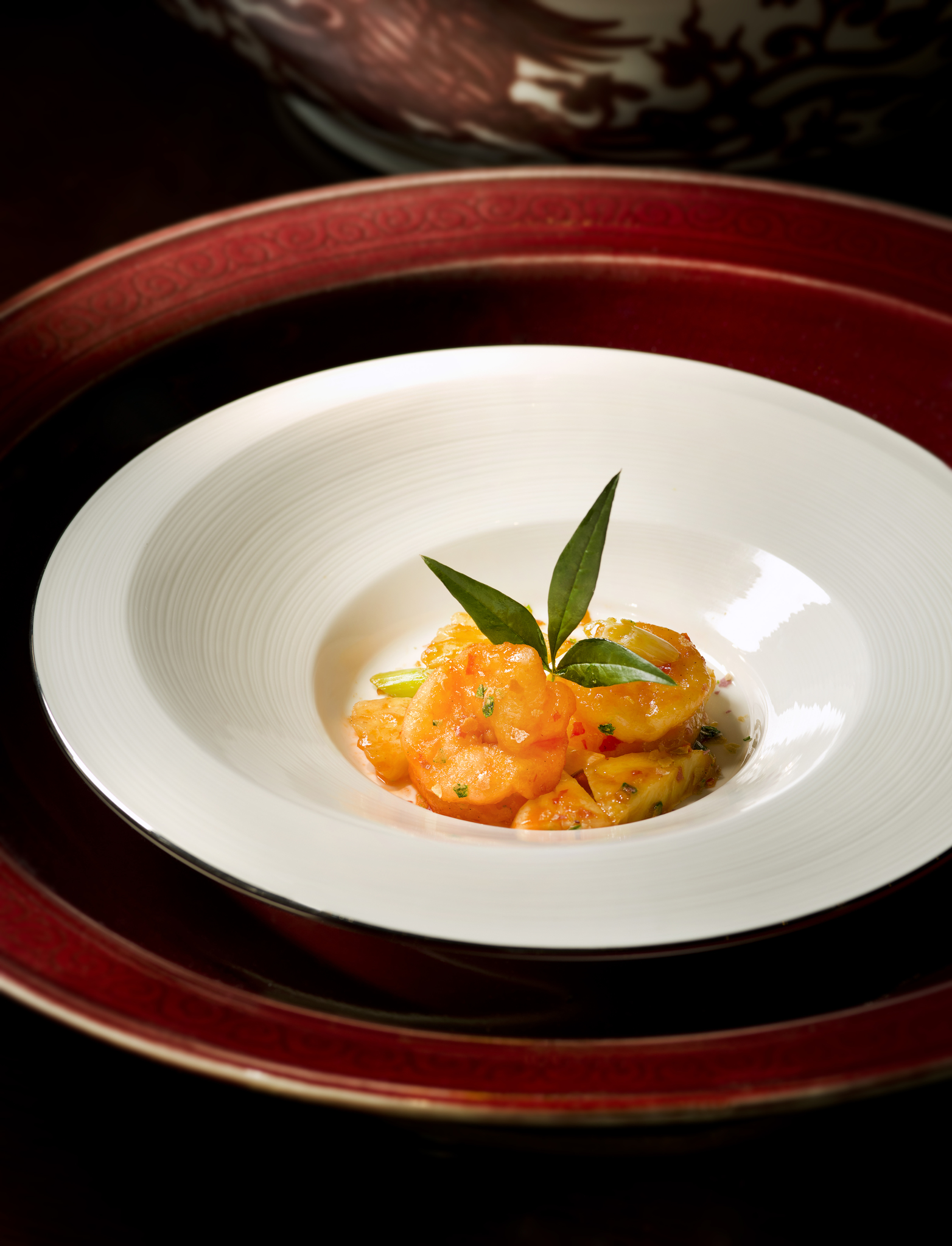 Lai Heen's pan-seared prawn with pineapple in grain white wine sauce