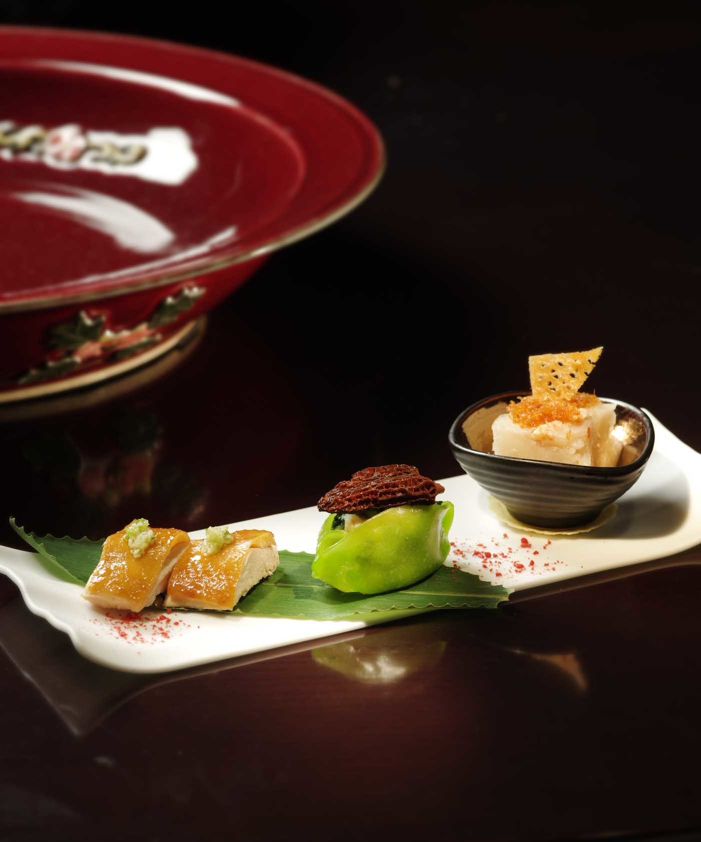 Lai Heen's steamed vegetables dumpling with morel mushroom, marinated chicken in soy sauce, and steamed turnip cake with homemade shrimp paste