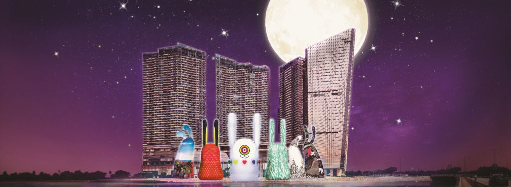 Poster showing unique lantern shapes in front of a cityscape and moonlight