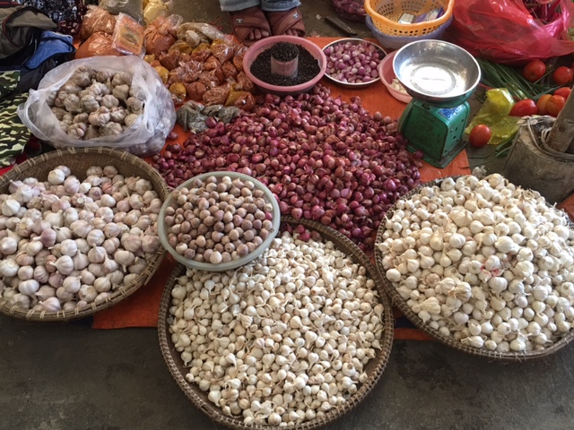A selection of dried beans, nuts, and legumes. 
