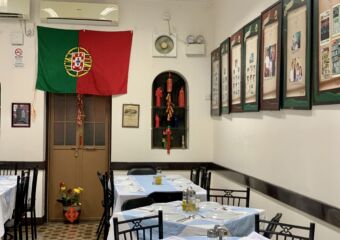 O Santos Restaurant Indoors Tables Upstairs with Portuguese Flag on the Wall Wide Macau Lifestyle