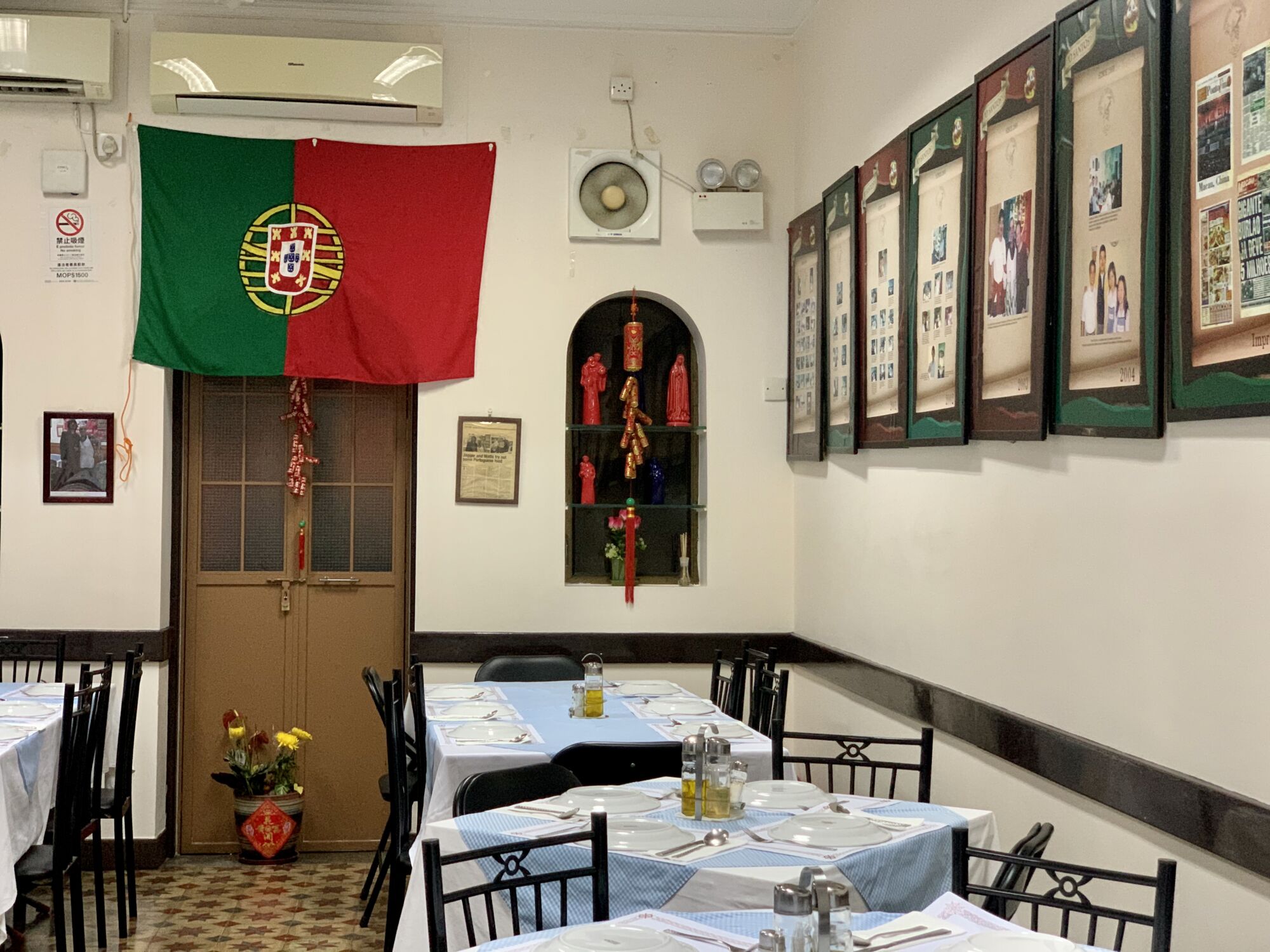 O Santos Restaurant Indoors Tables Upstairs with Portuguese Flag on the Wall Wide Macau Lifestyle