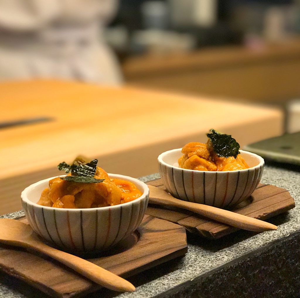 Japanese cuisine presented on wooden plates