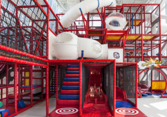 The large red playground area at Kids City at City of Dreams in Macau