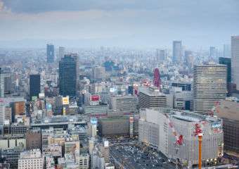 an aerial view of the skyline of the japanese city of osaka