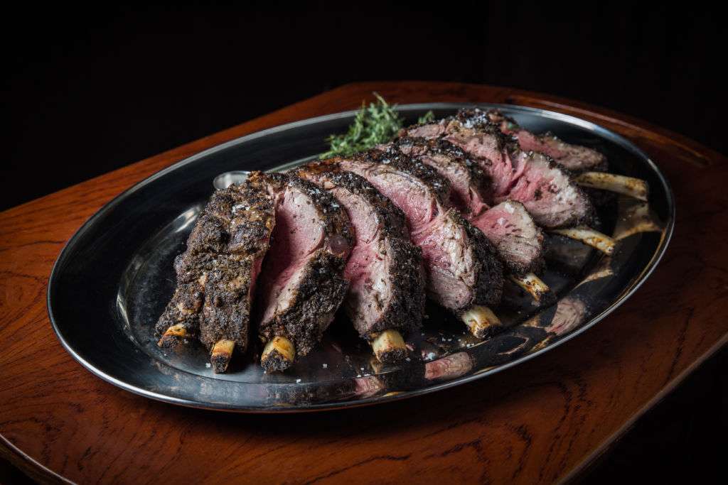 A dish of sliced steak. 