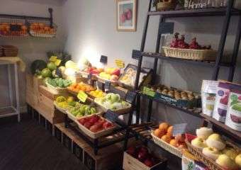 Interior of Fruiton shop with display of fruit.