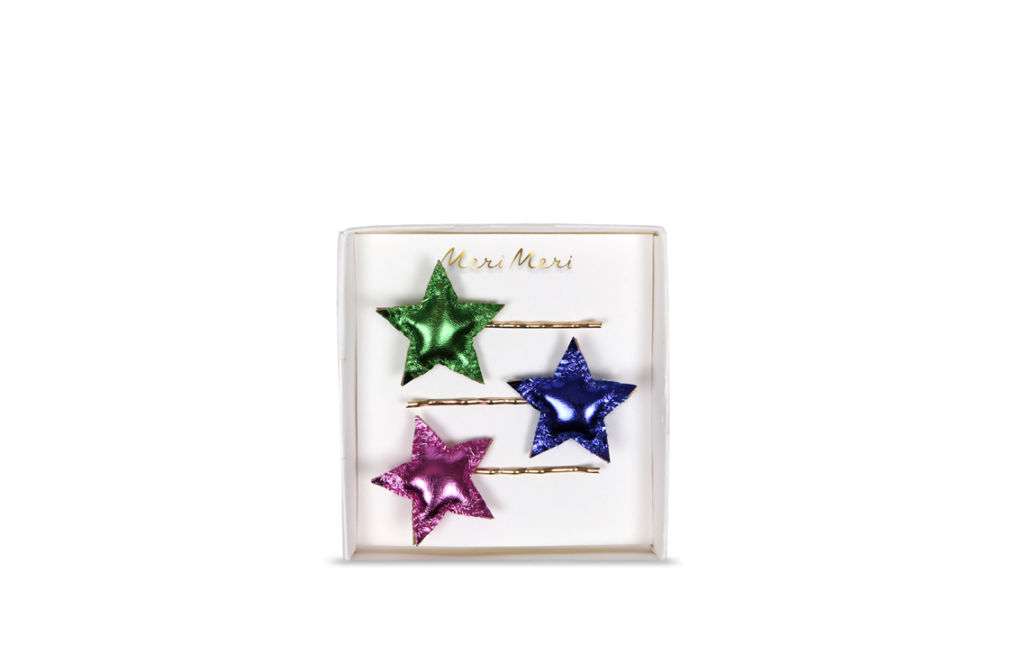 A set of star-shaped hair clips. 