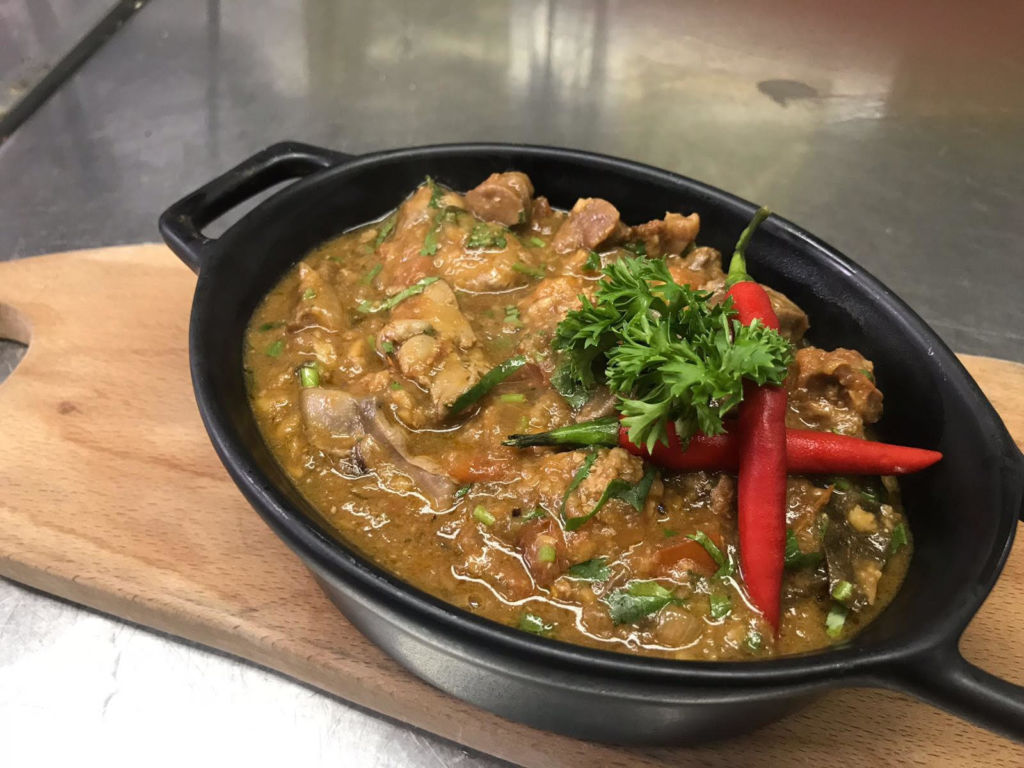 Portuguese pipis dish in a cast iron pan. 