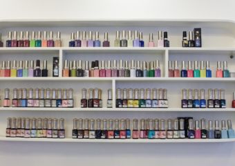 Shelves displaying various types of nail polish