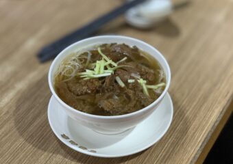 Pacapio Good Fortune Beef Noodles on the Table Distorted Background Macau Lifestyle