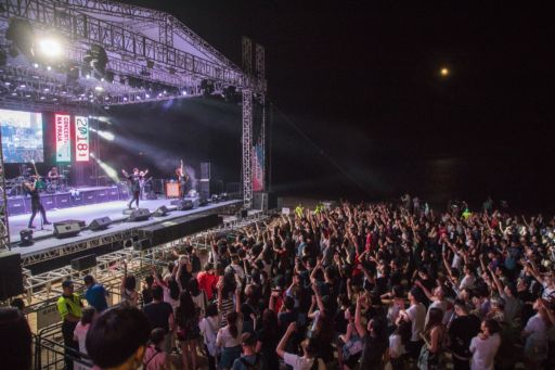 hush music festival at night, crowds