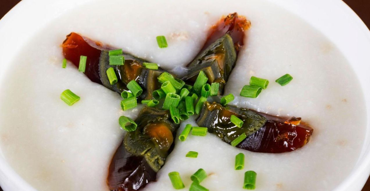 Macau dishes century egg congee