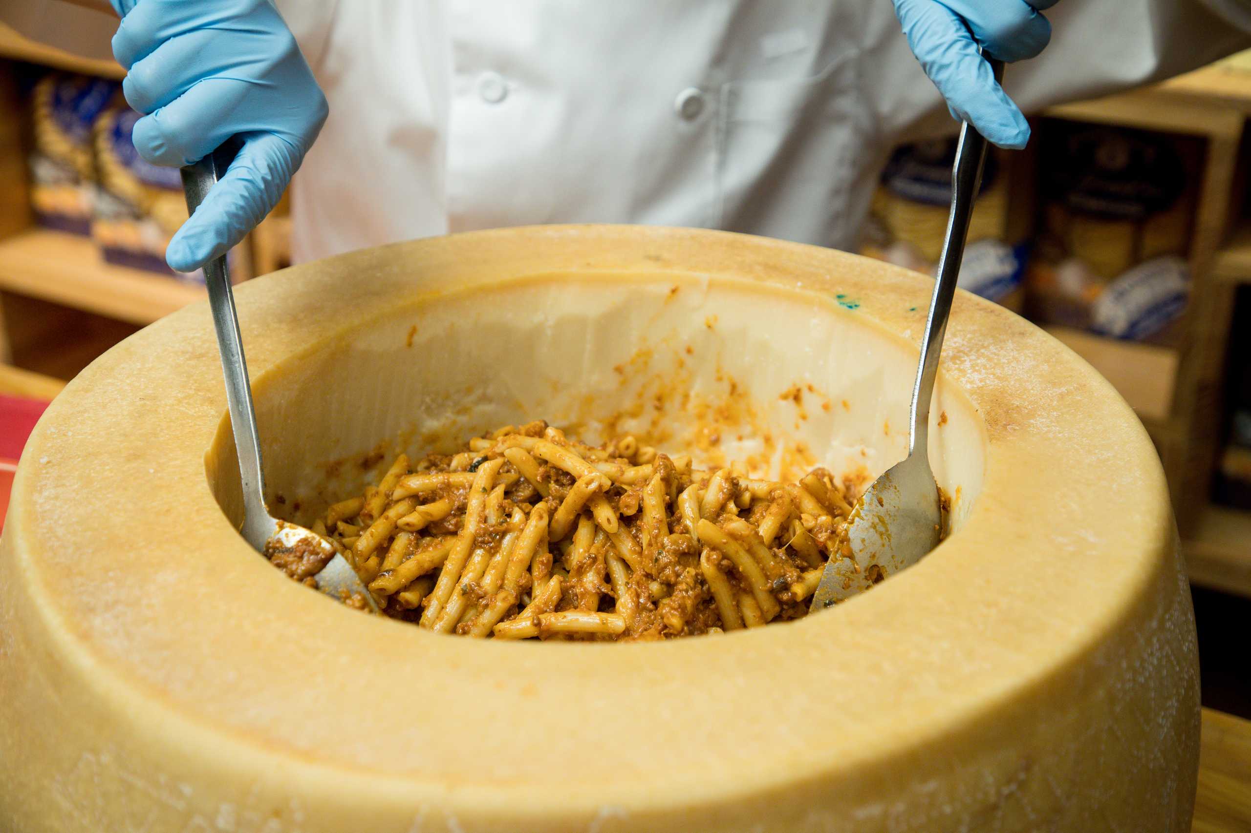 small penne pasta tossed in bolognaise and porcini mushroom sauce