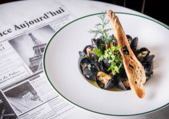 Le French GourMay Sautéed black mussel in white wine, butter and parsley