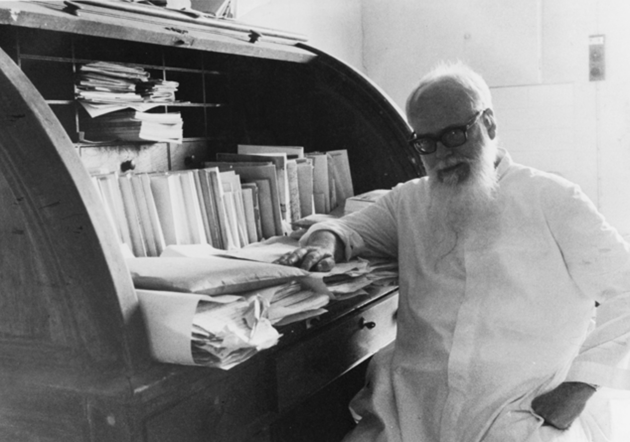 Priest Manuel Teixeira Close to Books Black and White Portrait