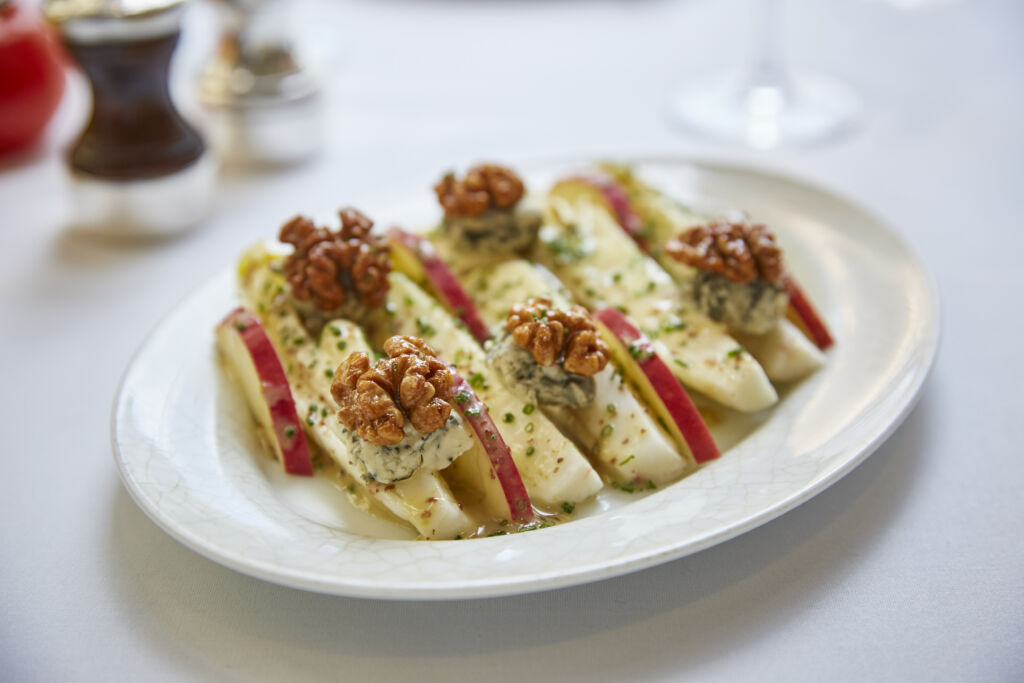 hong kong march hot tables La Petite Maison Endives Salad with Gorgonzola and Caramelized Walnuts