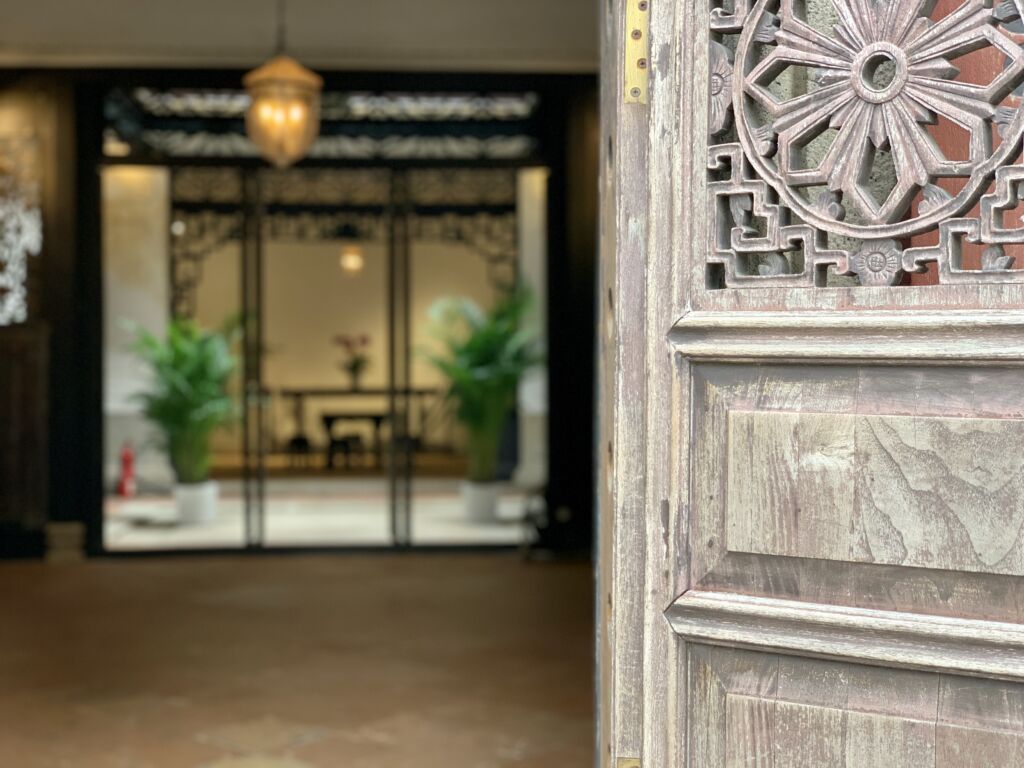 Mandarins House Unfocused Background with Chinese Door Detail Macau Lifestyle