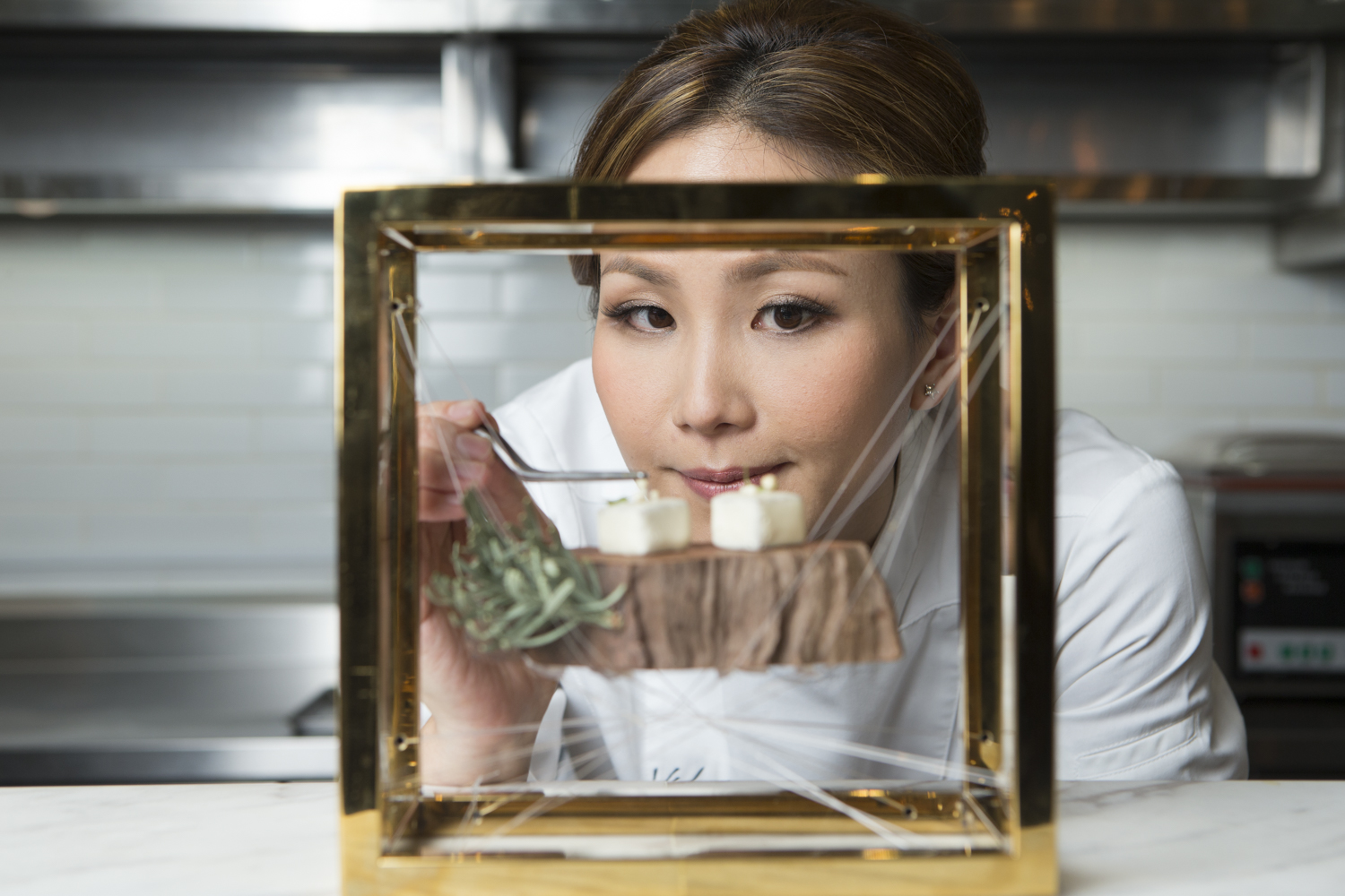 Vicky Lau portrait with a dish Tate Dining Room