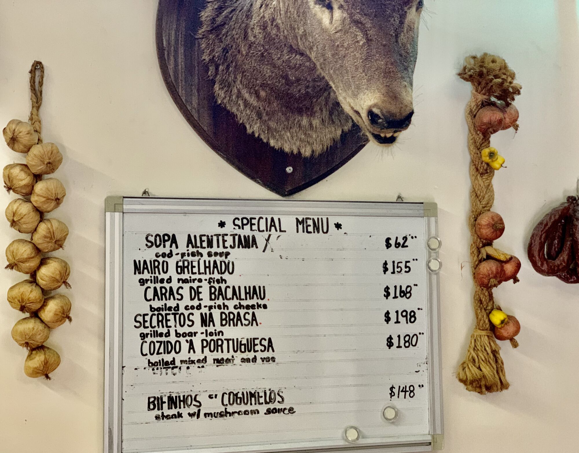 Petisqueira Interior Animal Head on the Wall and Board Menu Macau Lifestyle