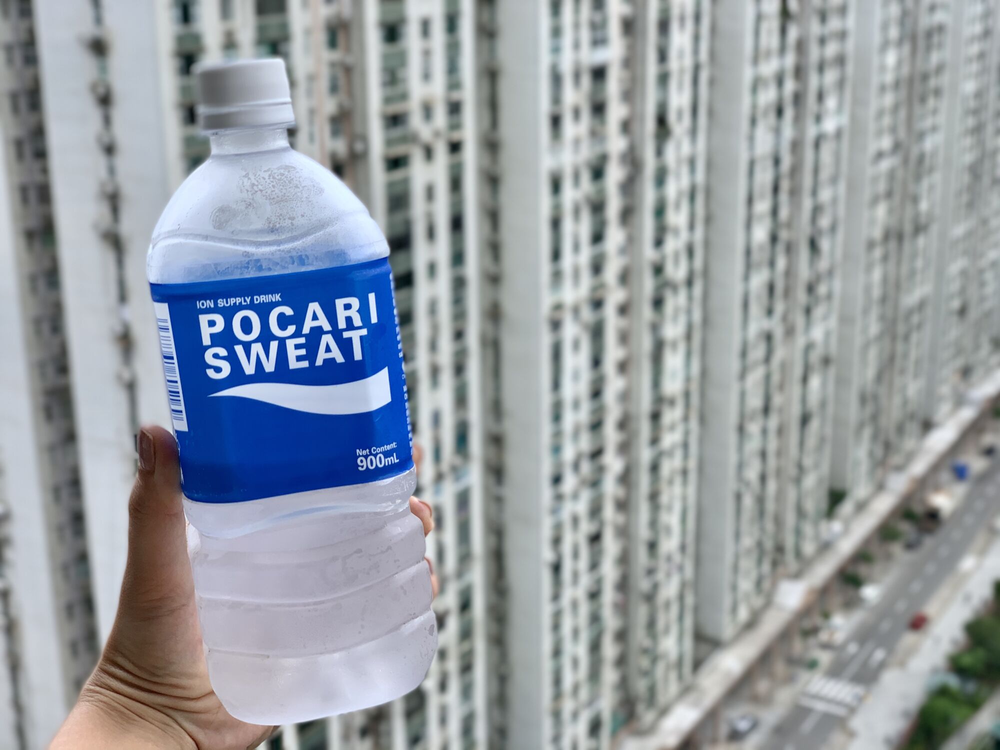 Bottle of Pocari Sweat Against Blurry Background Macau Lifestyle