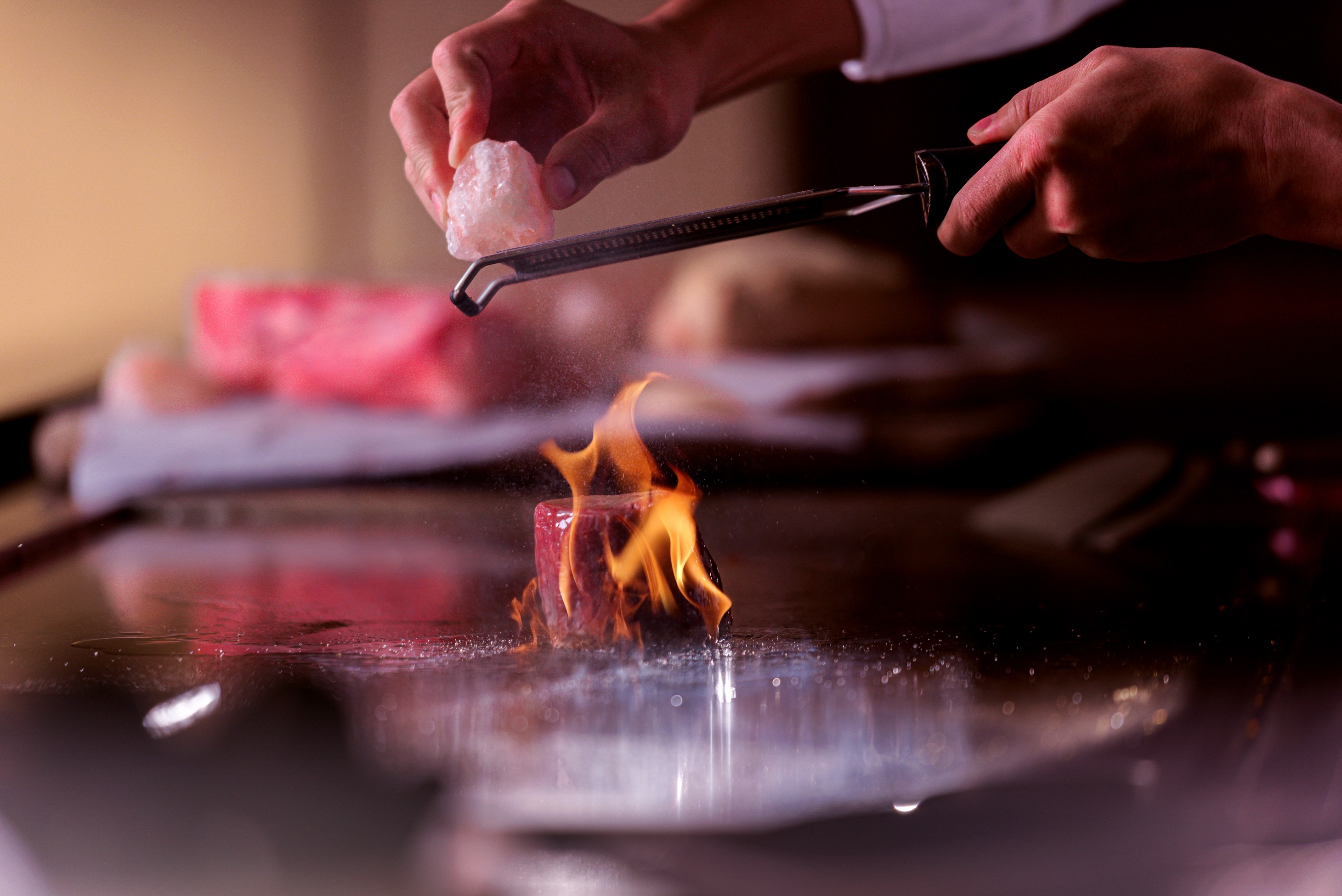 MGM Culinary tour himalayan salt grated over steak
