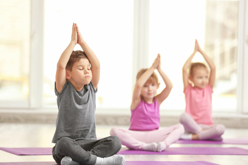 Group of children doing gymnastic exercises