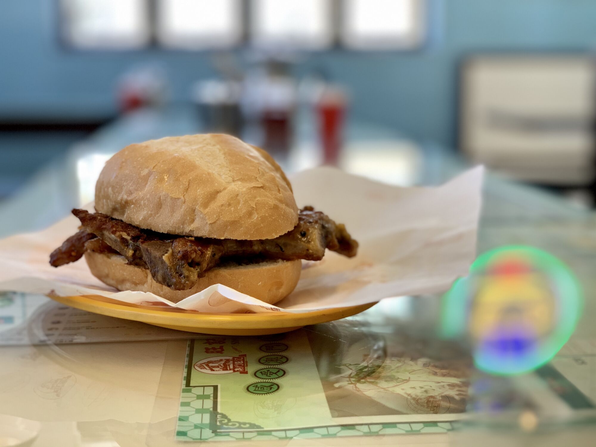 Veng Kei Taipa Village Pork Chop Bun on the table Macau Lifestyle