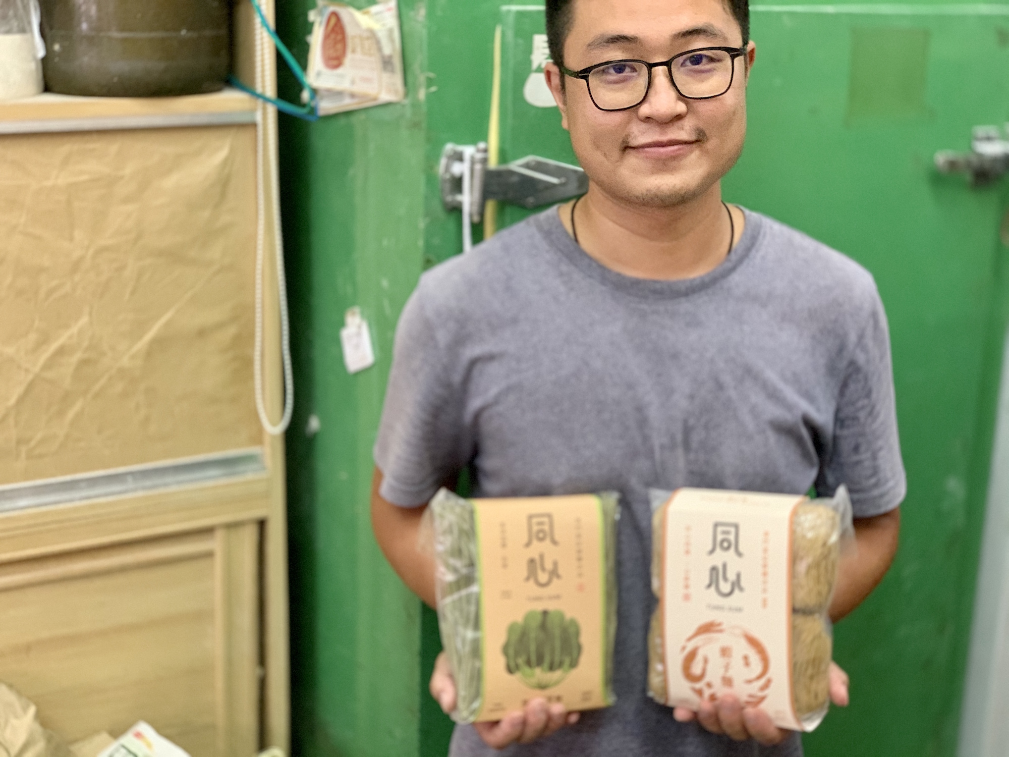 Cheong Kei Noodles Owner Holding Noodles Inside Macau Lifestyle