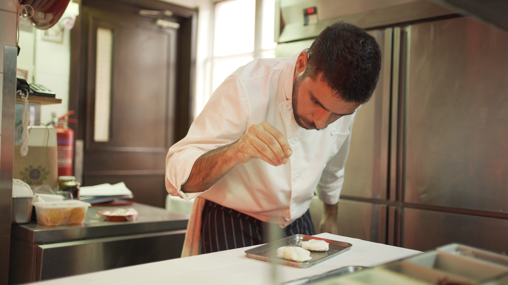 Chef David Abreu from Antonio Pouring Salt on Food