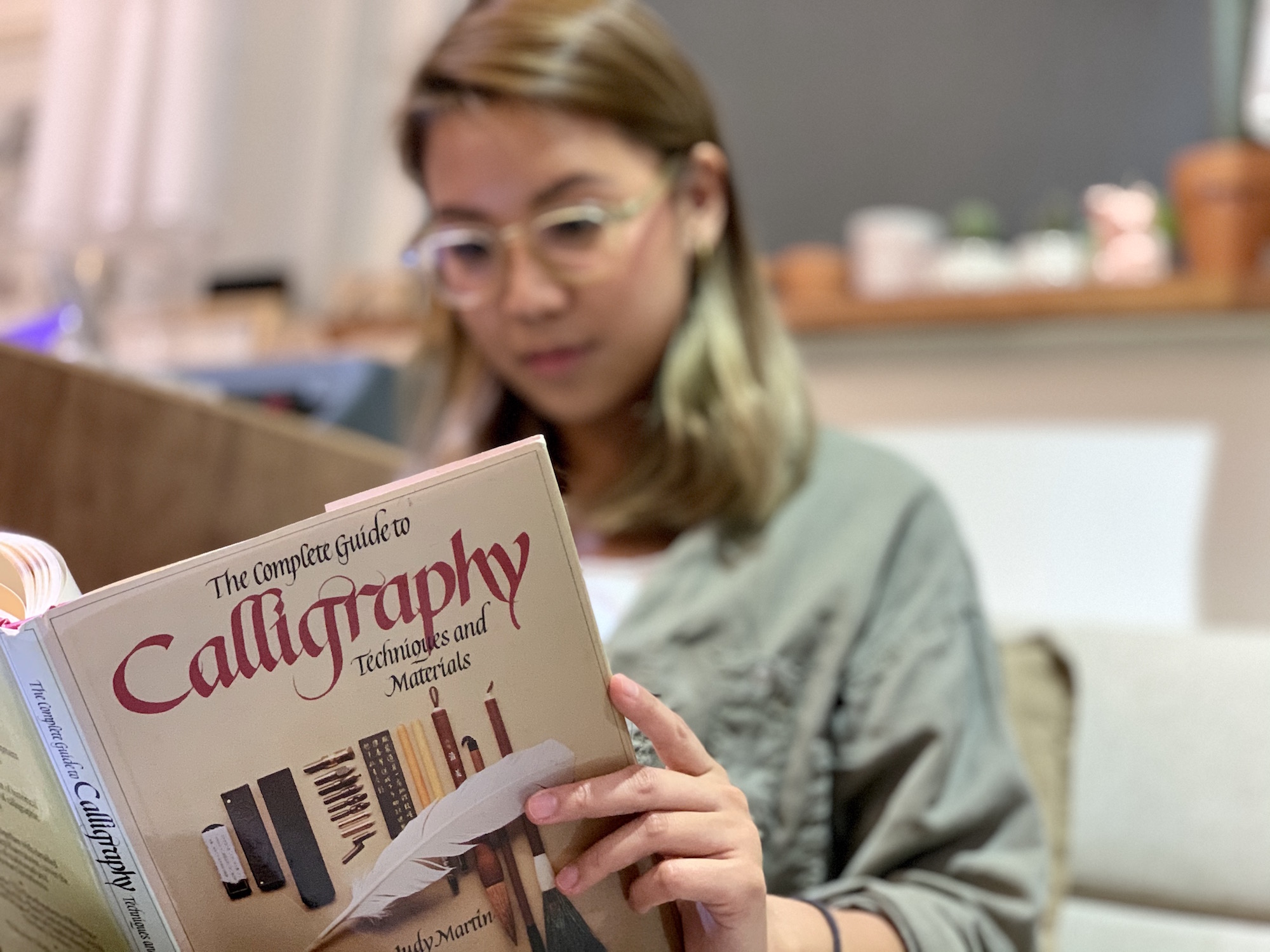 Belinda Chim with Book in Hand Closer Shot Macau Lifestyle