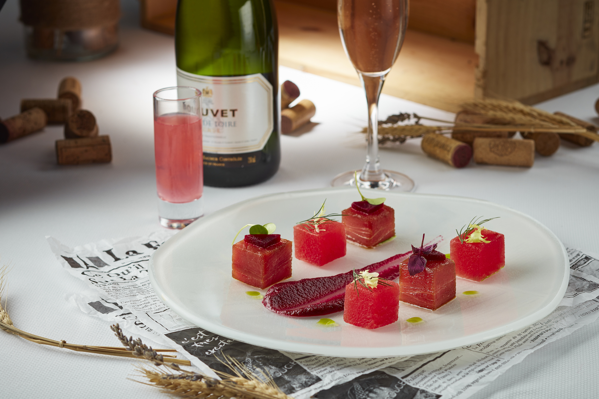Marinated yellow fin tuna, compressed watermelon and tomato water with beetroot coulis Parisian Macao Brasserie French GourMay