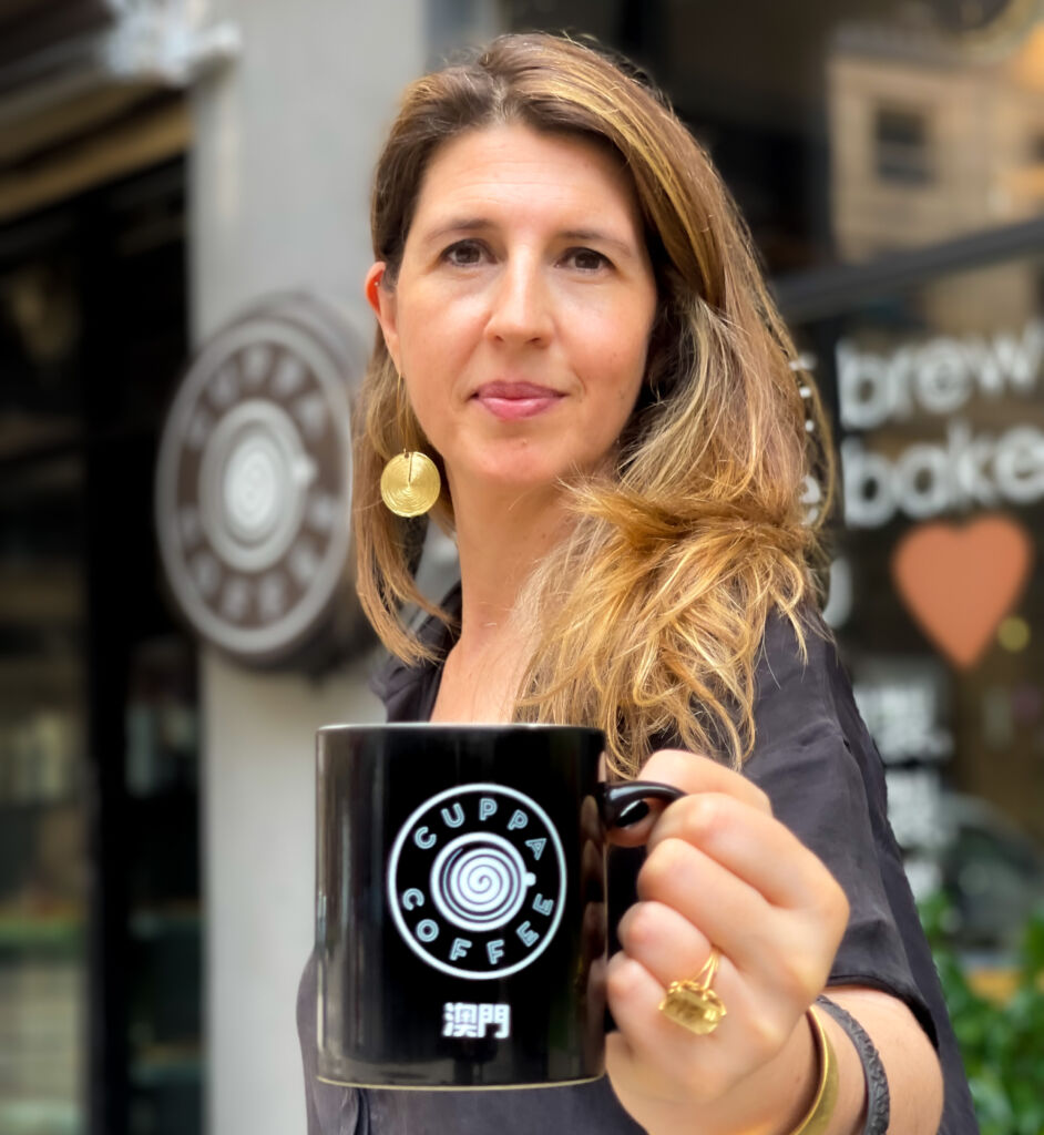 Cristiana Figueiredo from Cuppa Coffee with Coffee Cup in Hand Photo Credits Cassia Schutt