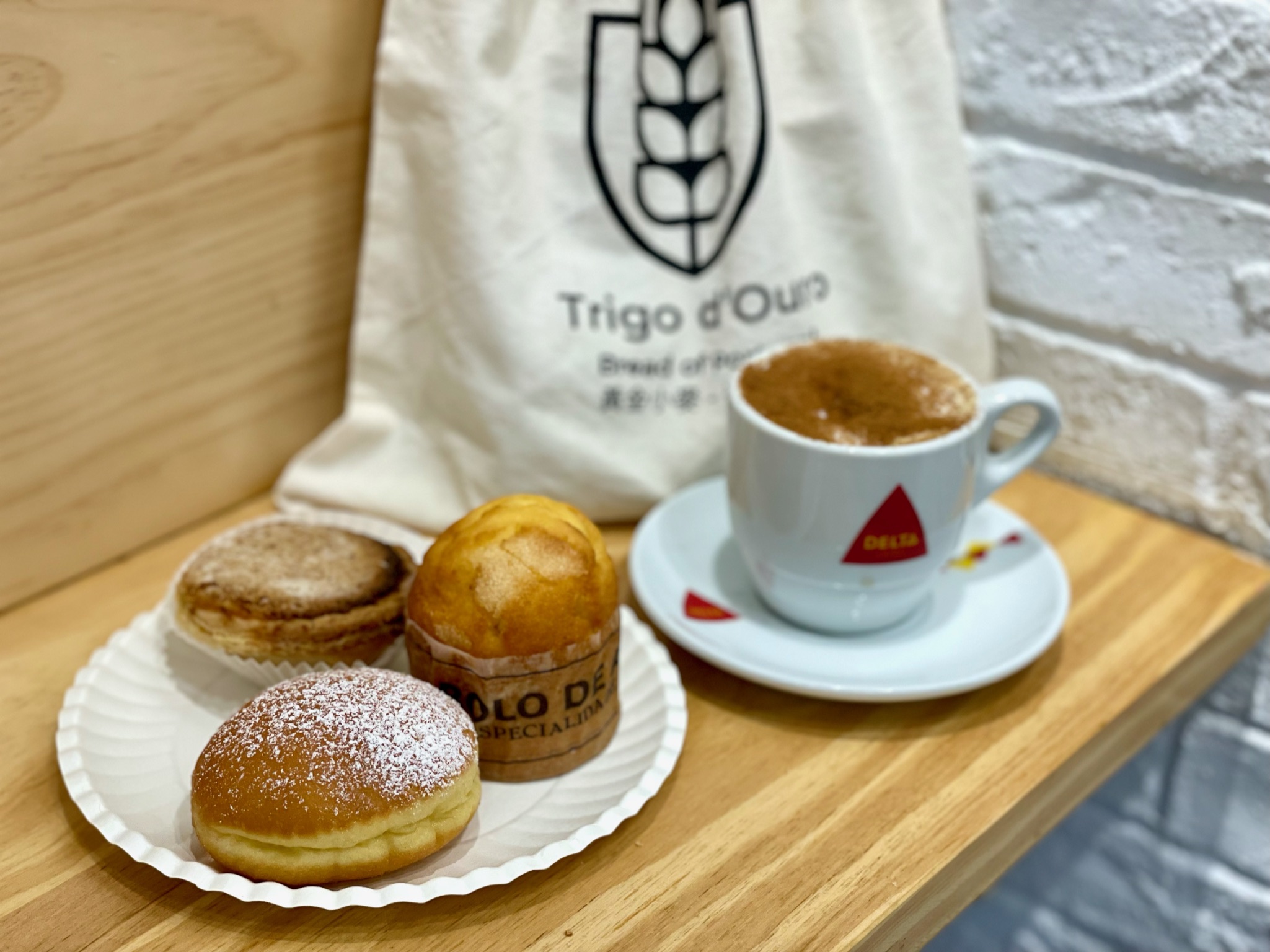 Selection of Pastries at Trigo DOuro with Bag in the Background Macau Lifestyle