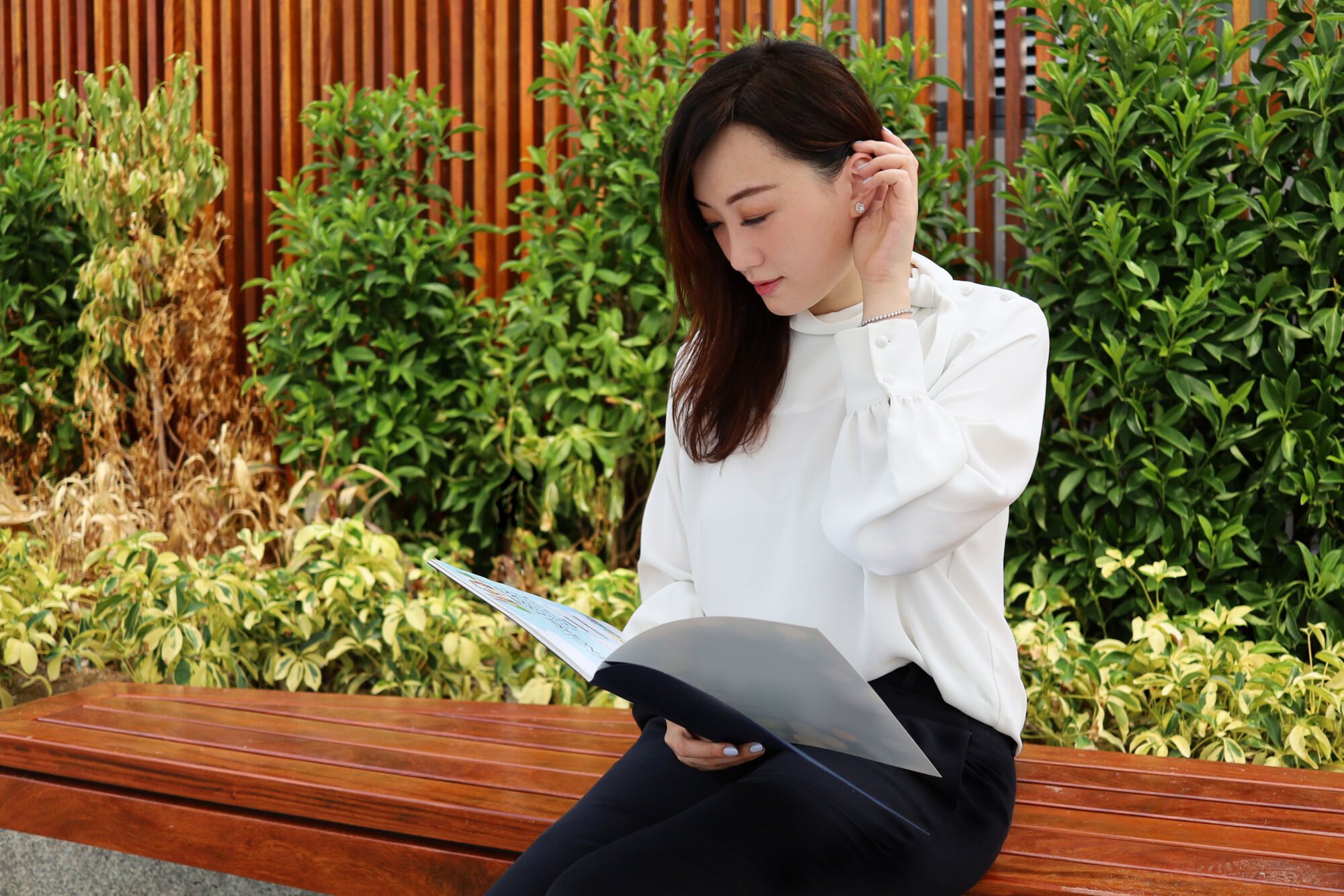 Sandy Leong Portrait Looking at a Book