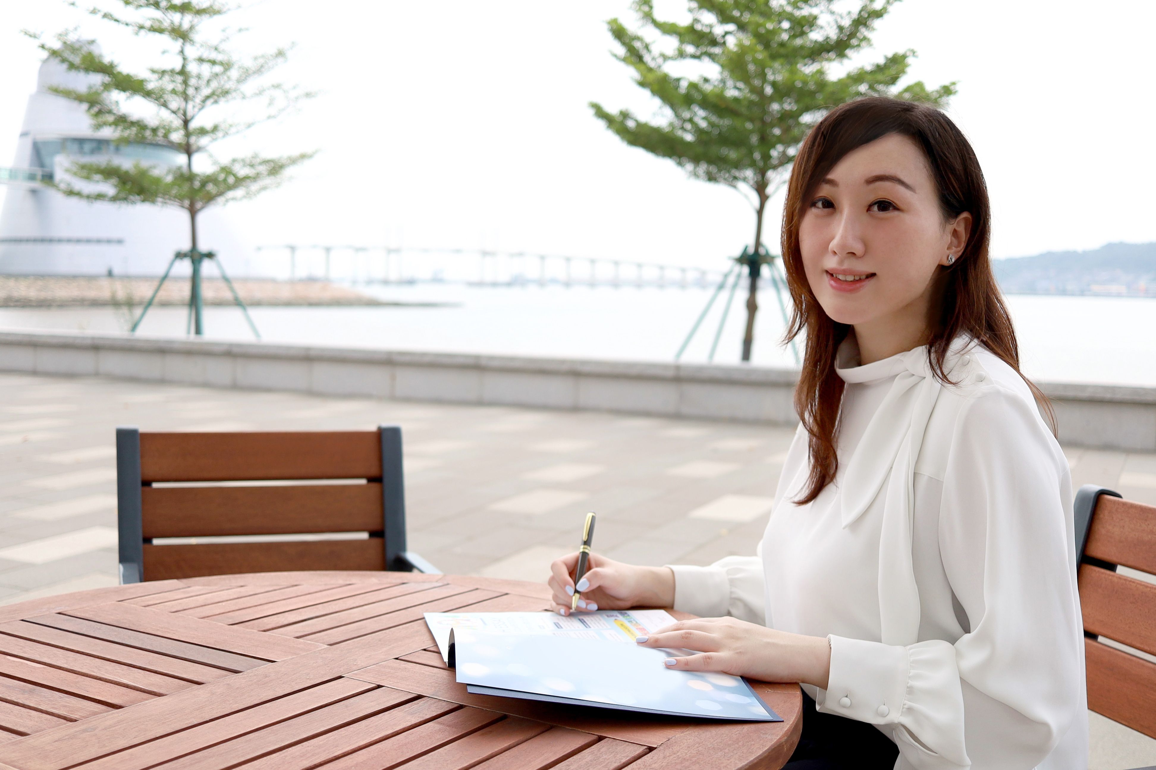 Sandy Leong Portrait by the Lake Looking at the Camera