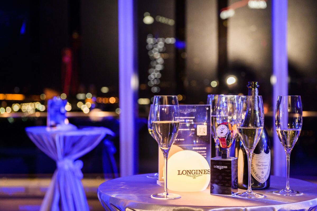 Longines Master Collection Now Shines in Macau wristwatch flutes and Macau backdrop